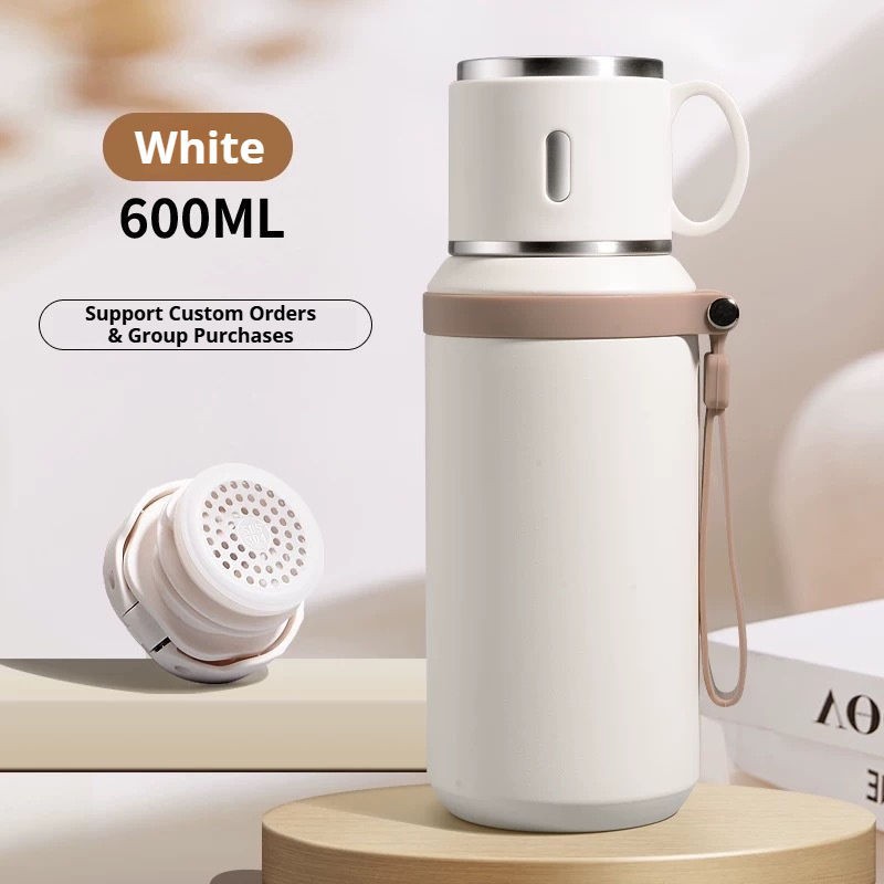water bottle with cup on top